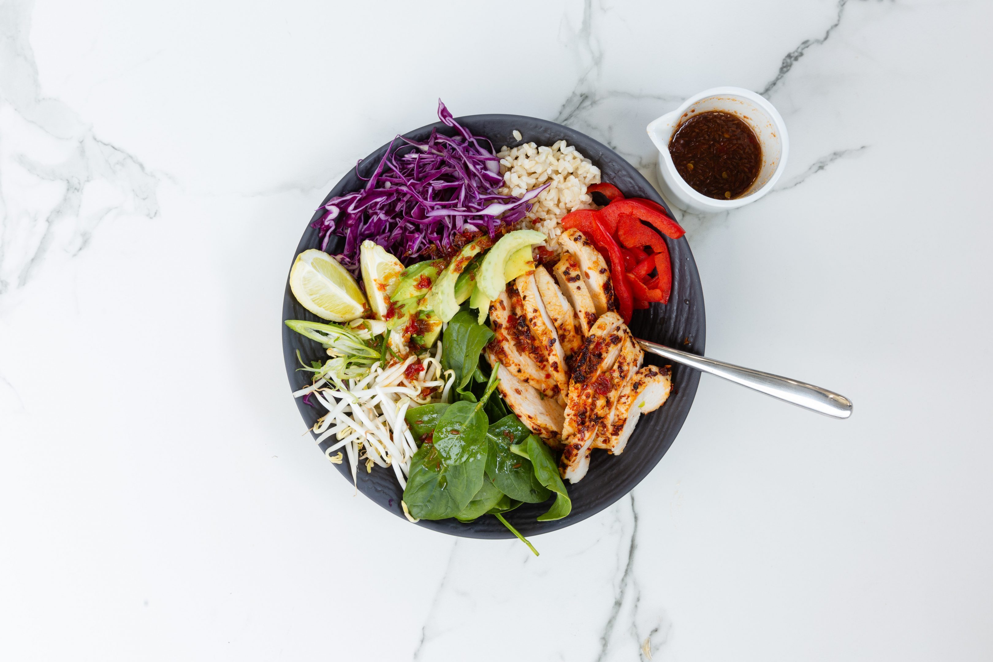 poke bowl with chicken rice and vegetables