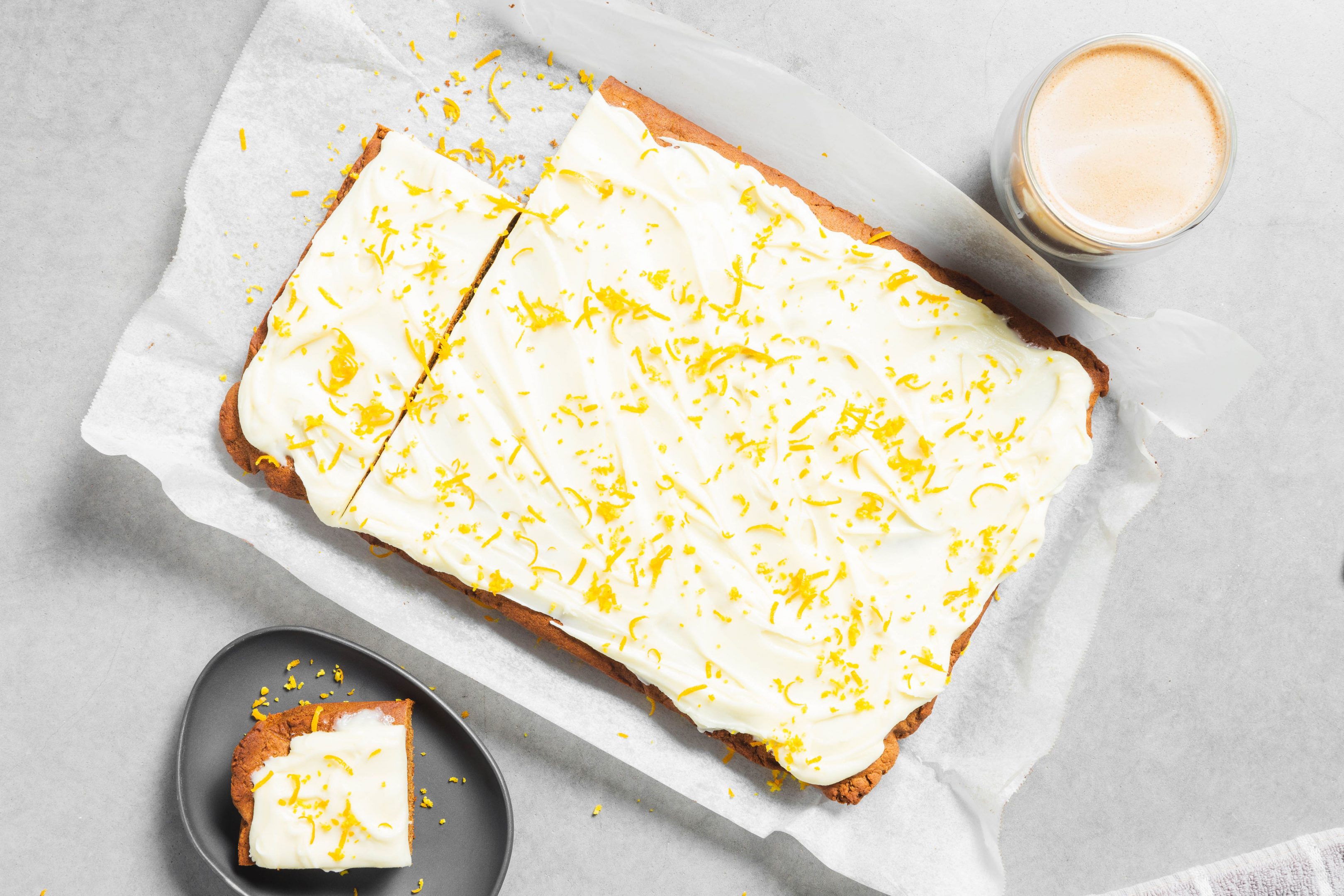 chai slice with cream cheese icing and lemon zest