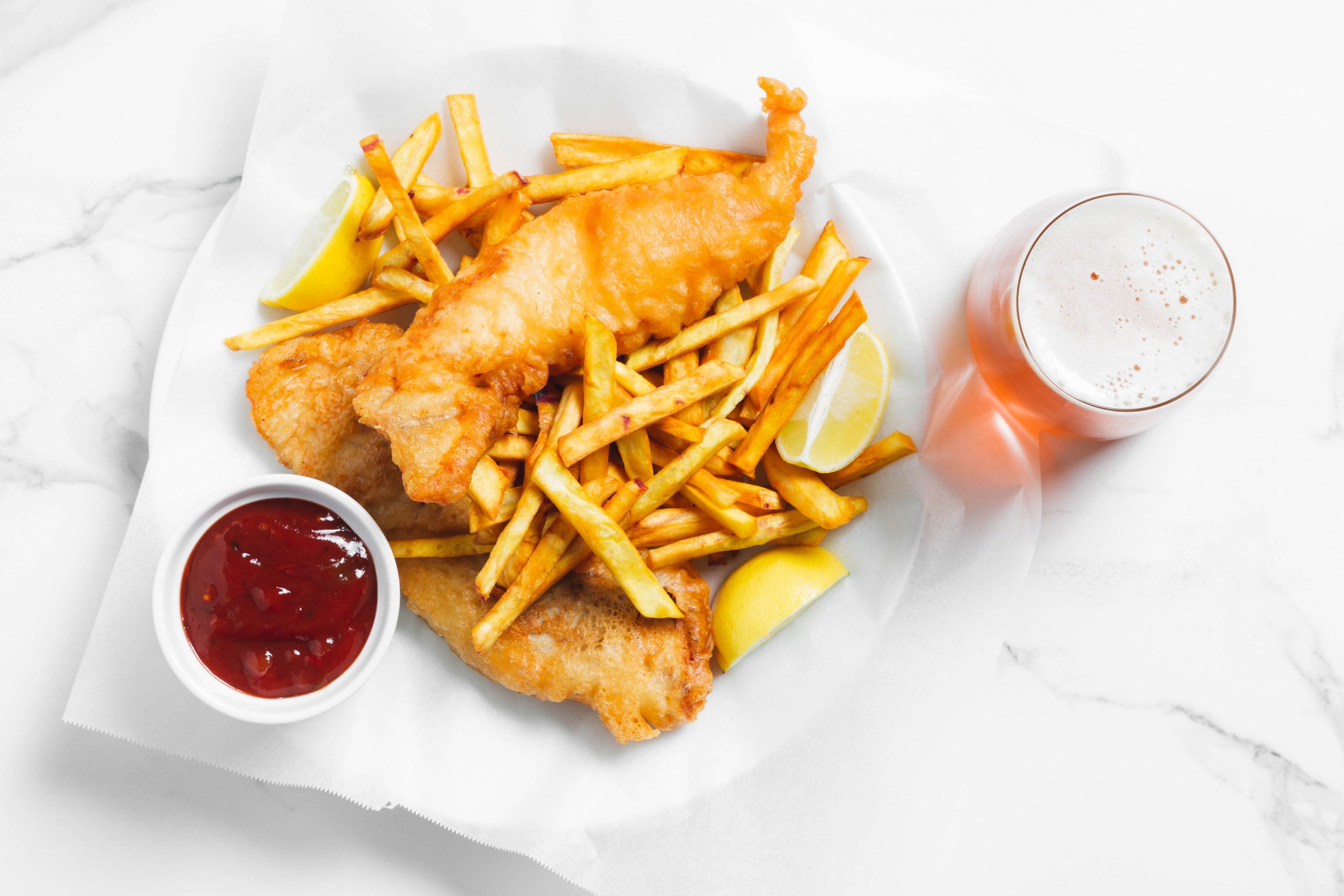 beer battered fish and chips with lemon and tomato relish