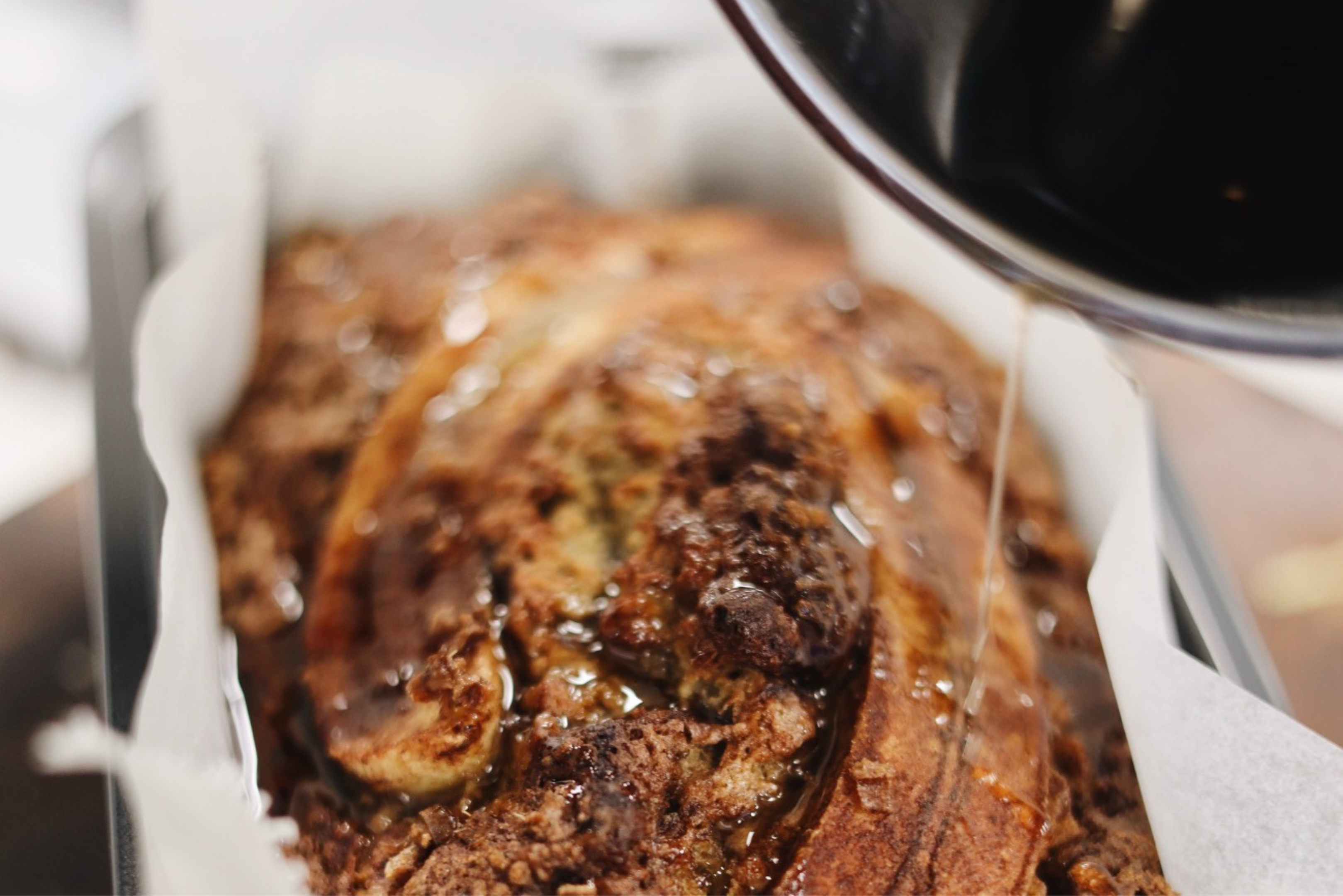 ginger banana loaf drizzled with syrup